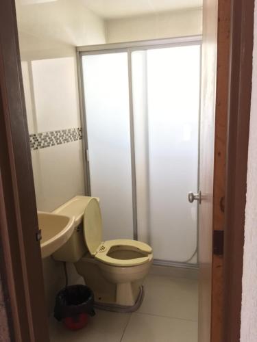 Un baño de Departamentos Maggio