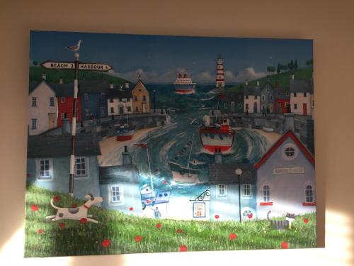 a painting of a city with a town at Worthing Rest in Worthing