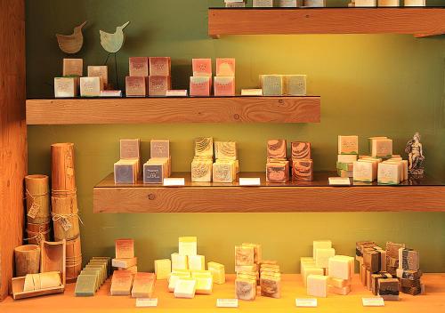 a display of books on shelves in a store at Comma&Spa Resort in Seogwipo
