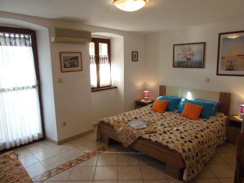 Ένα ή περισσότερα κρεβάτια σε δωμάτιο στο Apartment Noemi