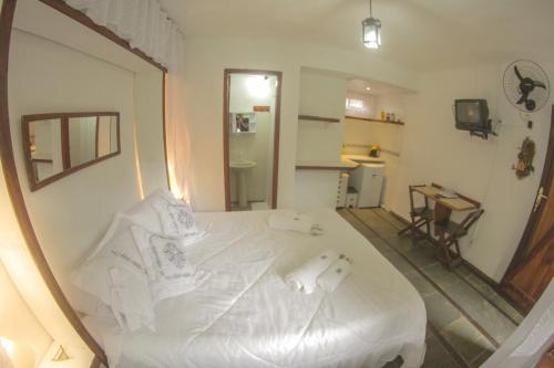 Tempat tidur dalam kamar di Country Inn, Suites & Condo