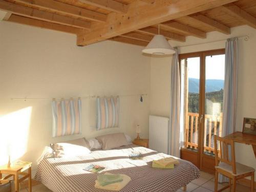 Postel nebo postele na pokoji v ubytování Chalet l'Angélique