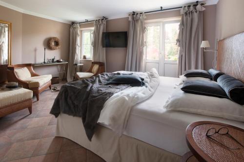 Postel nebo postele na pokoji v ubytování Hotel VILLINO