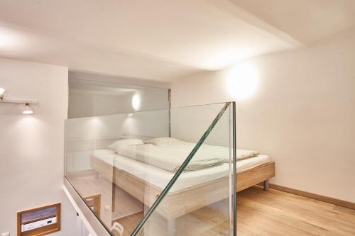 Posteľ alebo postele v izbe v ubytovaní V27 Apartment | hostAID