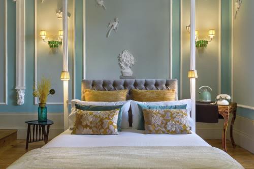 En eller flere senge i et værelse på Boavista Eco-Luxury House