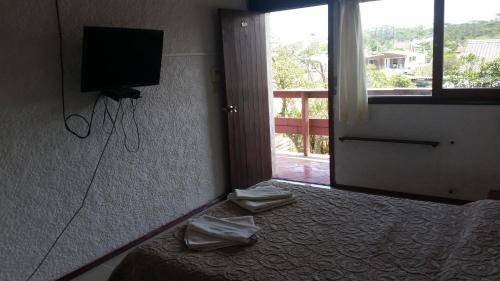 Postel nebo postele na pokoji v ubytování Hotel Yeruti