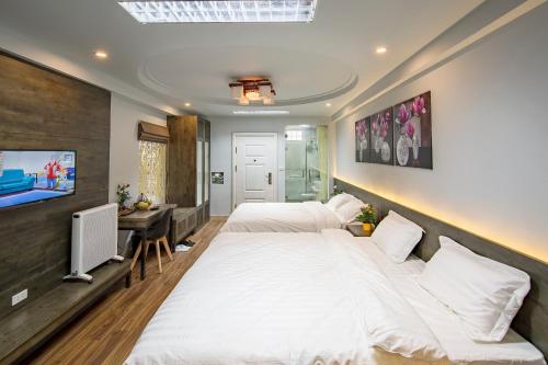 Cama o camas de una habitación en Hanoi Moon Cactus