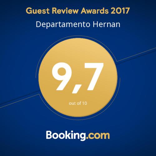 a sign that reads guest review awards deprecatory heinemann out at Departamento Hernan in Viña del Mar