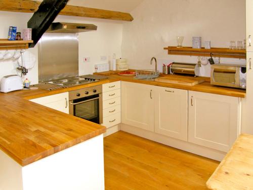 Bwthyn-y-Pairにあるキッチンまたは簡易キッチン