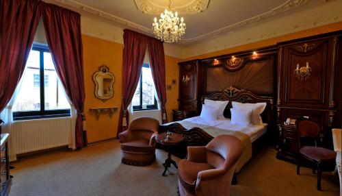 Postel nebo postele na pokoji v ubytování Bohema Boutique Hotel & Spa