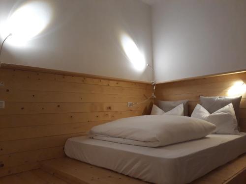 Säng eller sängar i ett rum på Antica Terrazza Pietramala