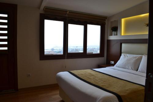 Postel nebo postele na pokoji v ubytování Seven Days Hotel - İstanbul