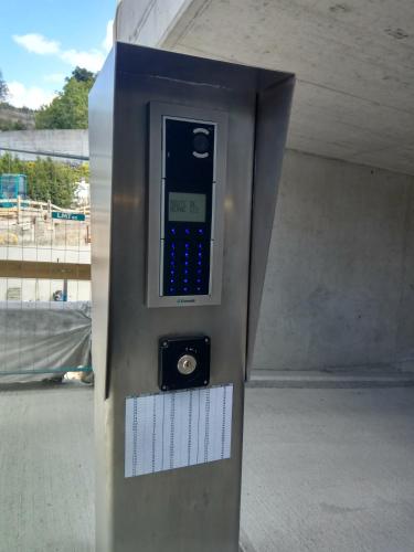 a close up of a parking meter in a building at Swissart | Lake View in Lausanne