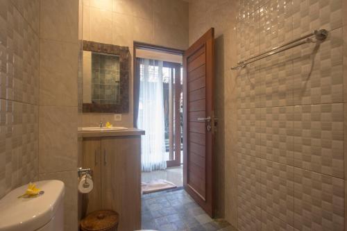 Koupelna v ubytování Nang Ade House