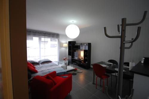 Кът за сядане в Appartement St Malo Rotheneuf