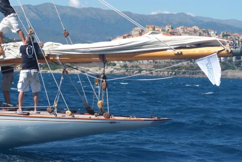a man on a sail boat in the water at Casa vacanze Cristina in Imperia