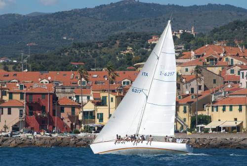 a group of people on a sail boat in the water at Casa vacanze Cristina in Imperia
