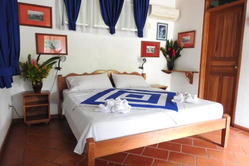 Ένα ή περισσότερα κρεβάτια σε δωμάτιο στο Hotel de Campo Caño Negro