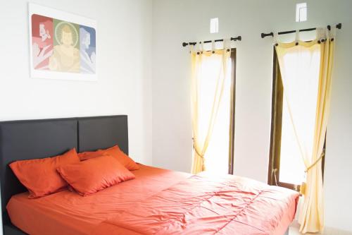 Katil atau katil-katil dalam bilik di LaGriya Guest House