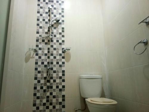 Koupelna v ubytování Villa Batu Iggy