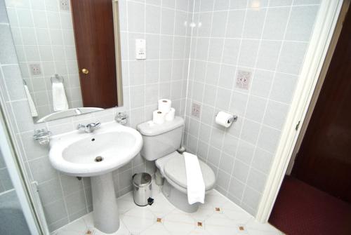 Koupelna v ubytování Alexandra Hotel