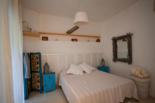 Postel nebo postele na pokoji v ubytování La Prua