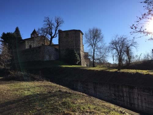 an old castle on a hill with a wall at B & B Da Giusy in Corte Franca