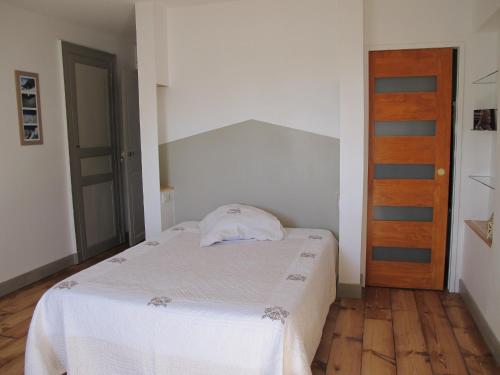 Ένα ή περισσότερα κρεβάτια σε δωμάτιο στο Villa Dampierre