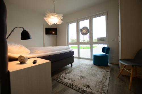 Postel nebo postele na pokoji v ubytování Luxstay Werder