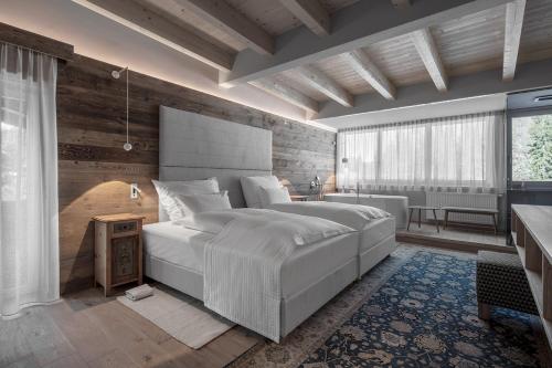Katil atau katil-katil dalam bilik di Hotel Ciasa Salares