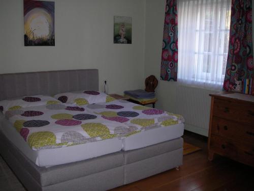 Una cama o camas en una habitación de Haus Gerstbauer