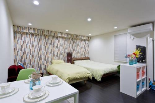 Postel nebo postele na pokoji v ubytování House In Azabu