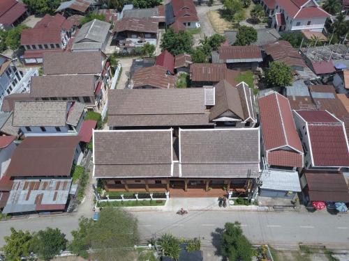 an overhead view of a town with houses at Jasmine Luangprabang Hotel in Luang Prabang