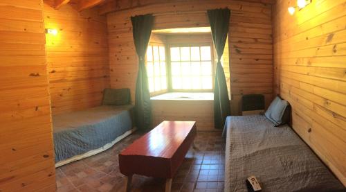 เตียงในห้องที่ Terrazas del Lopez