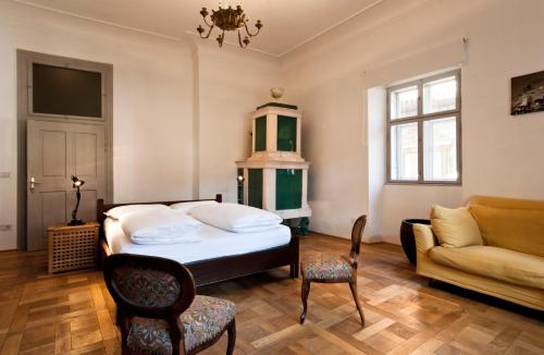Säng eller sängar i ett rum på Residence Fink Central Apartments