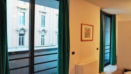 Fotografie z fotogalerie ubytování Caravaggio Apartments v Bergamu