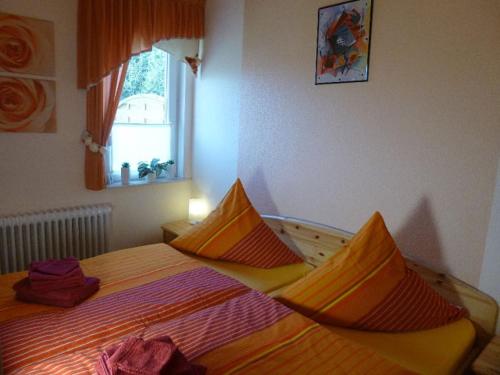 Postel nebo postele na pokoji v ubytování Ferienhaus "Finkennest"