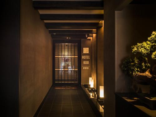 a hallway with a window in a building at Hotel Kuu Kyoto in Kyoto