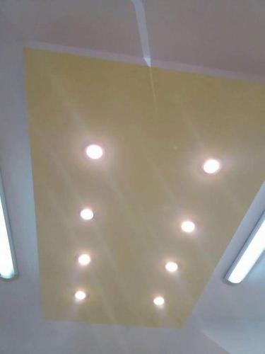 a ceiling with lights in a room at Guesthouse Vladimir & Ana in Pančevo