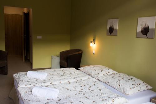 Postel nebo postele na pokoji v ubytování Hotel Belaria Resort
