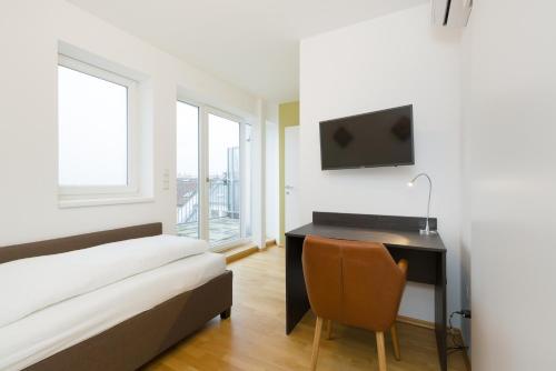Кровать или кровати в номере Vienna Stay Apartments Pezzl 1170