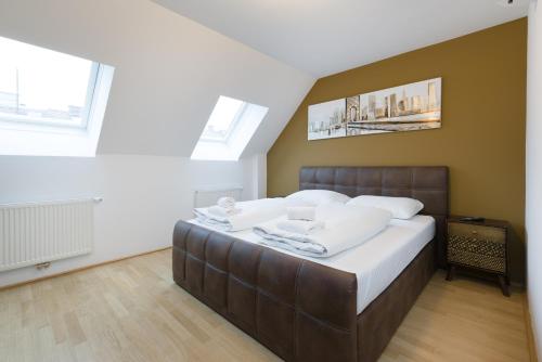 Кровать или кровати в номере Vienna Stay Apartments Pezzl 1170