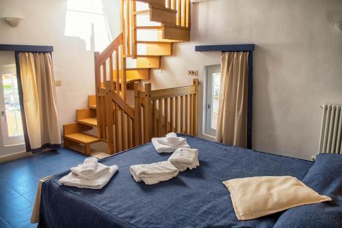 Posteľ alebo postele v izbe v ubytovaní Residence Villa Piani