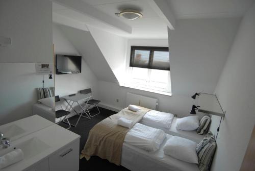 Säng eller sängar i ett rum på Annex