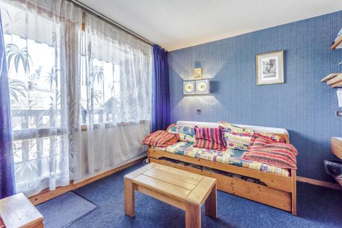 En eller flere senger på et rom på Residence Le Hameau du Sauget - maeva Home