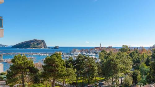 a view of a city and the water at Apartments Krug in Budva