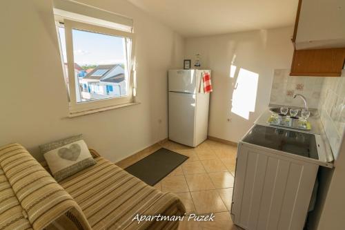 Kuchyň nebo kuchyňský kout v ubytování apartmani Puzek