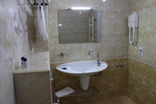Koupelna v ubytování Hotel Bleart