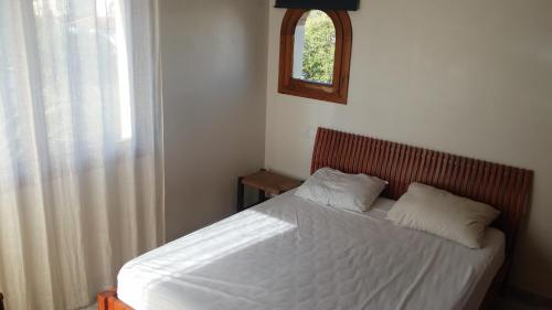 Un pat sau paturi într-o cameră la Villa Mas Sopes