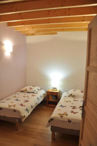 Una cama o camas en una habitación de Gîte de Kerauter